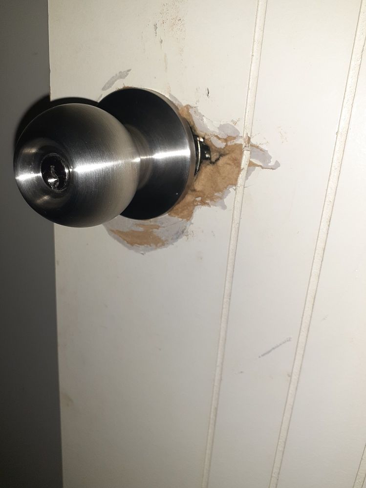 I changed the door knob but how do i cover up around it?