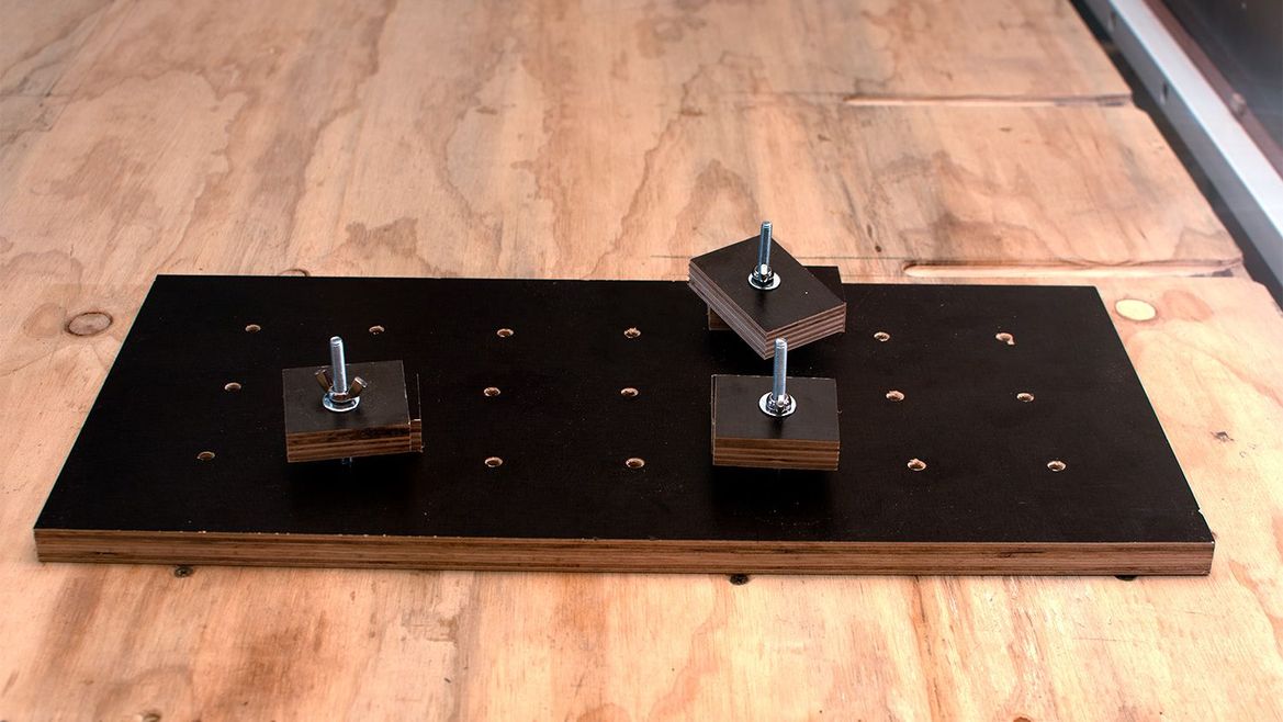 The very useful, multi-purpose plank of wood with holes in it.