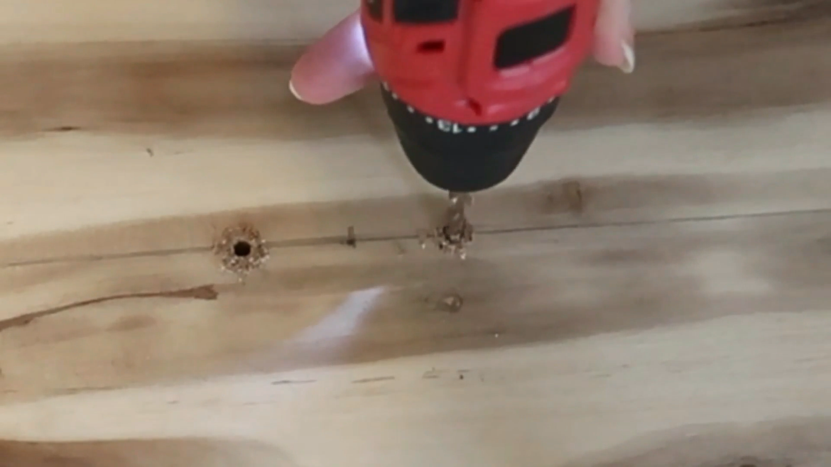 Drilling into the timber before it's painted means I don't have to worry about potential mistakes in positioning.