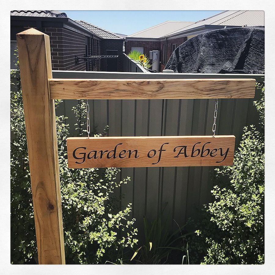 Garden sign made from left over building materials