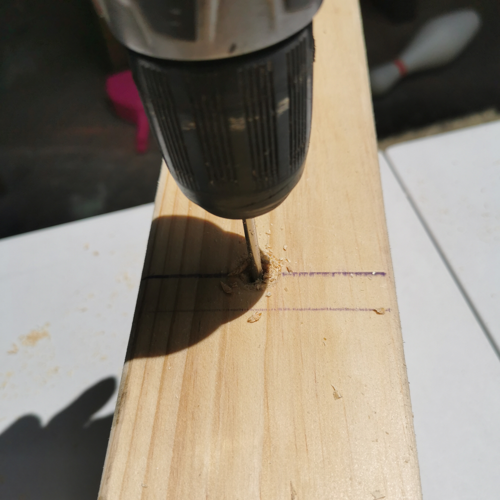 3.5 Pre-drilling middle rail through topand bottom rail.png