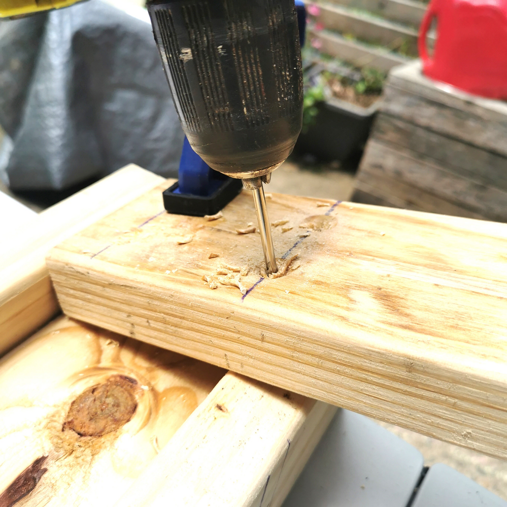 5.2 Pre-drilling middle and bottom rail through legs.png