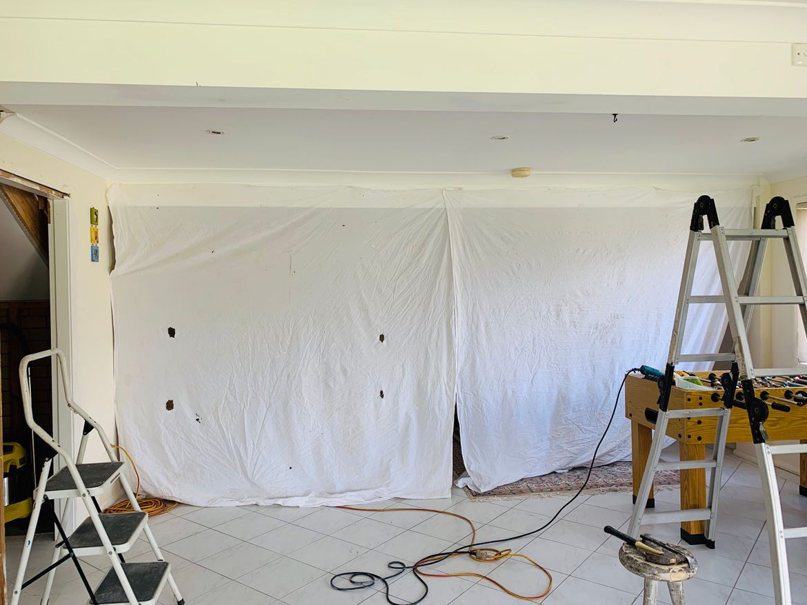 First up protect the rest of the room from dust