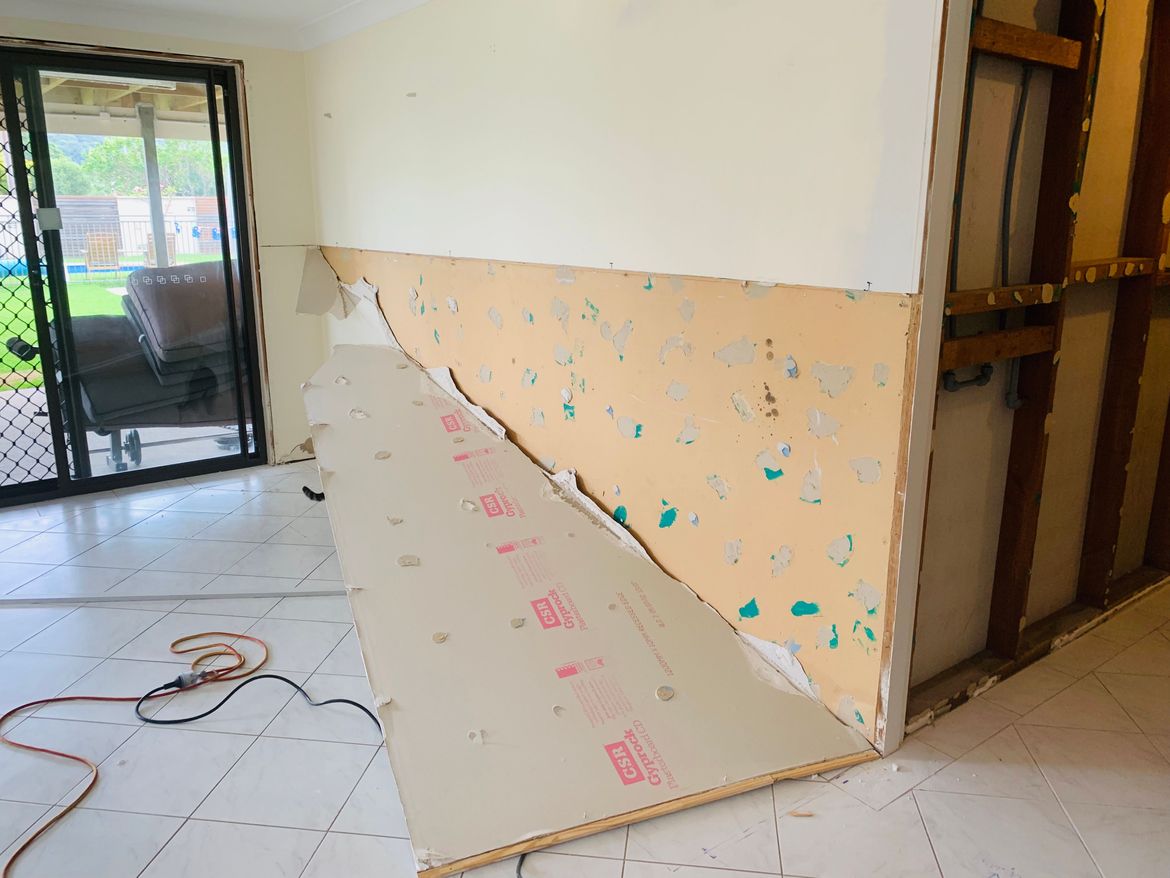 Skinning the wall to allow my sparky to run cables and run water pipes. Oh look double skin!!