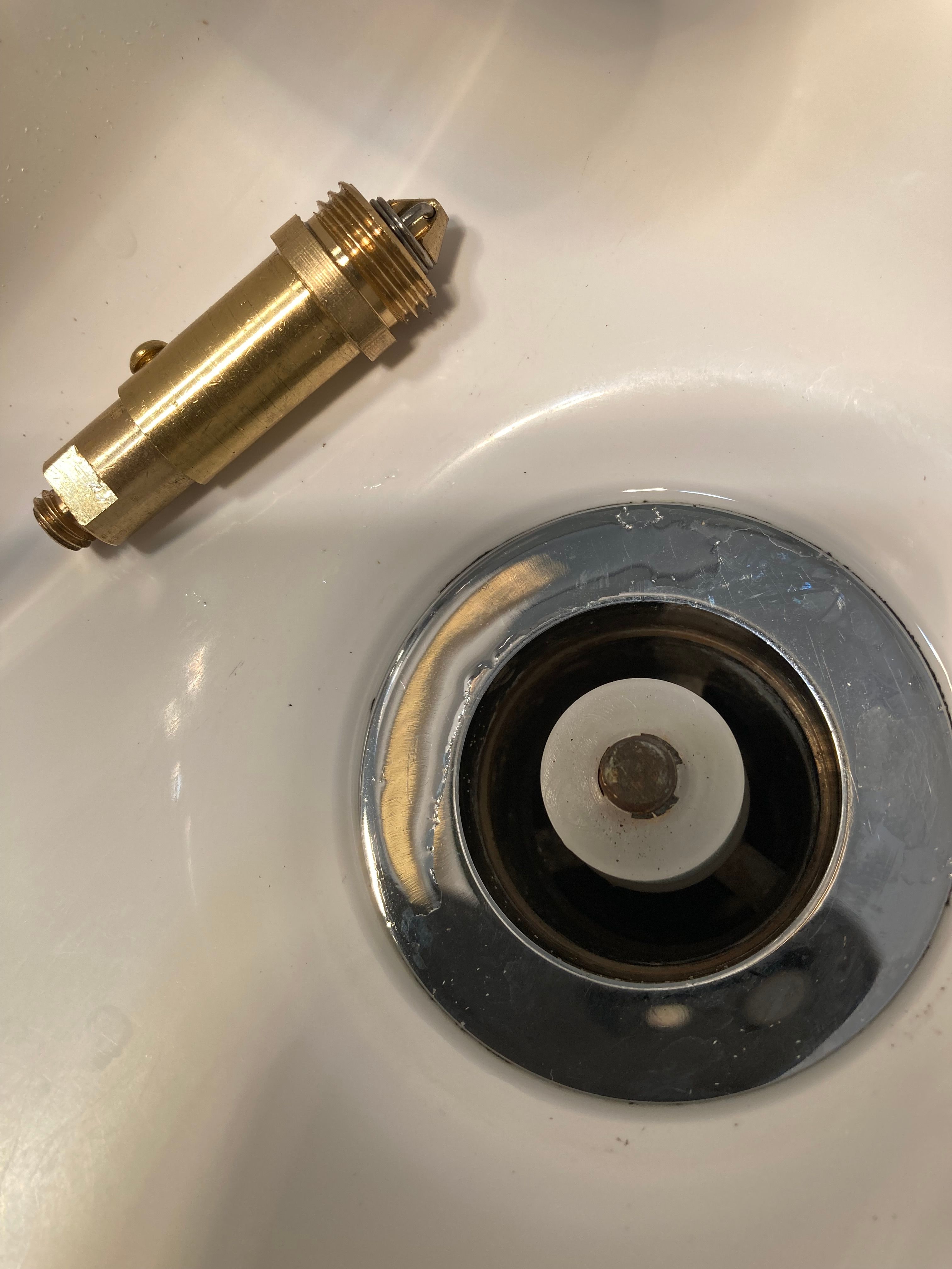 How to replace a pop up plug mechanism w... Bunnings community