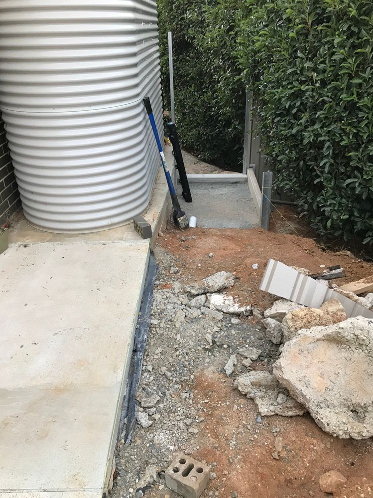 Concrete path, drainage and retaining wall work to follow.