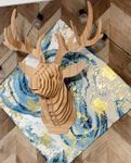 antler head on fabric back board