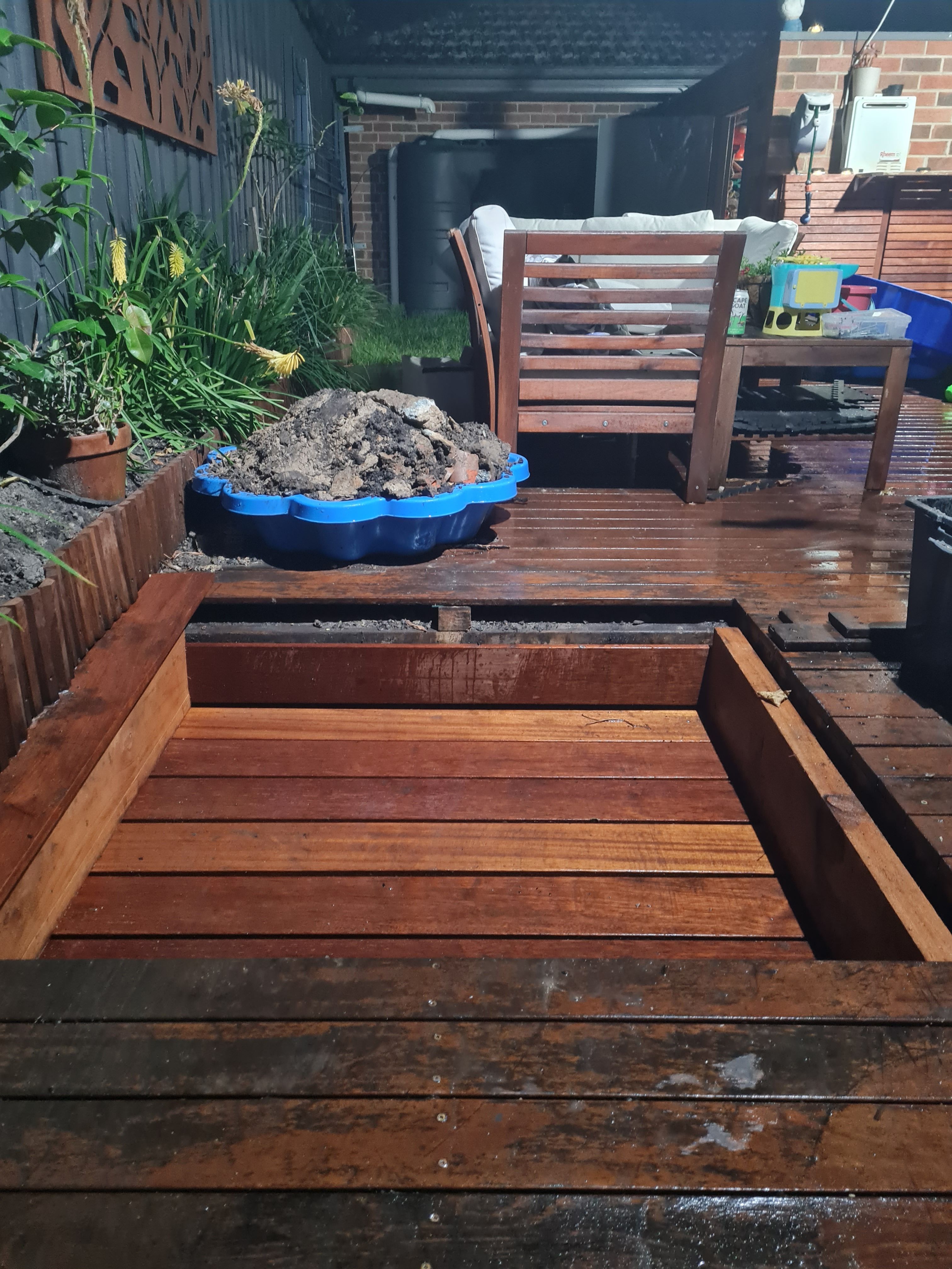 Sandpit with cover under existing deck Bunnings community