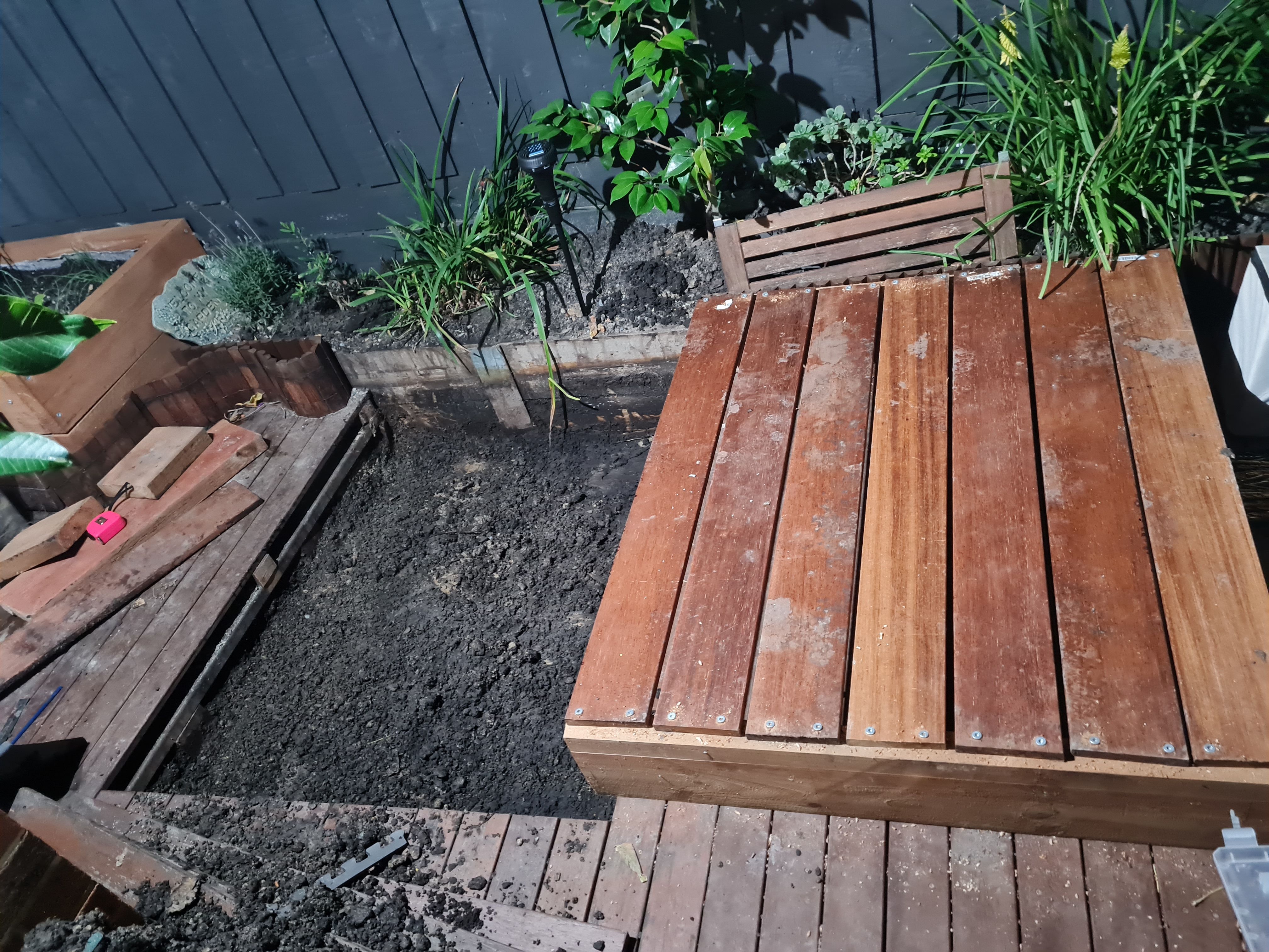 Sandpit with cover under existing deck Bunnings community