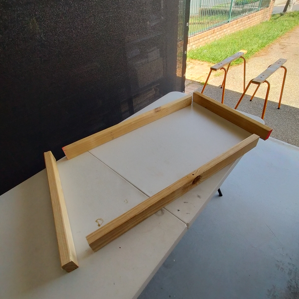 Step 2.1 Line up fisrt shelf pieces.png