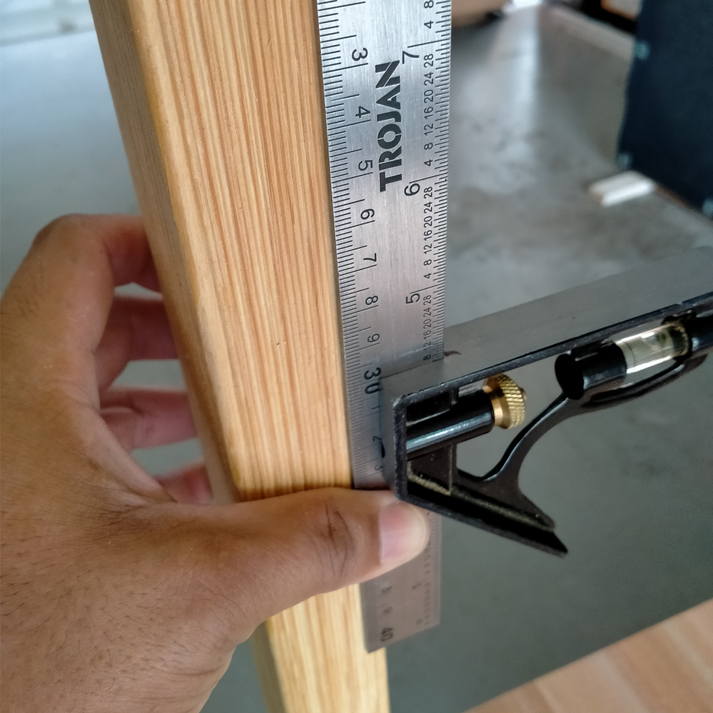 Step 6.1 Mark 300mm from bottom of top shelf.png