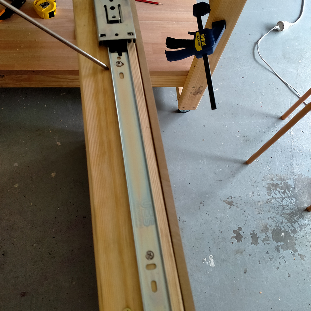 Step 7.2 Screw drawer slide to shelf..png