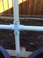 Cross joiner with pop rivets