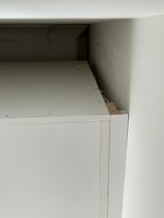 Area behind Cabinet to ceiling