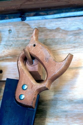 Close up of hanging saw.
