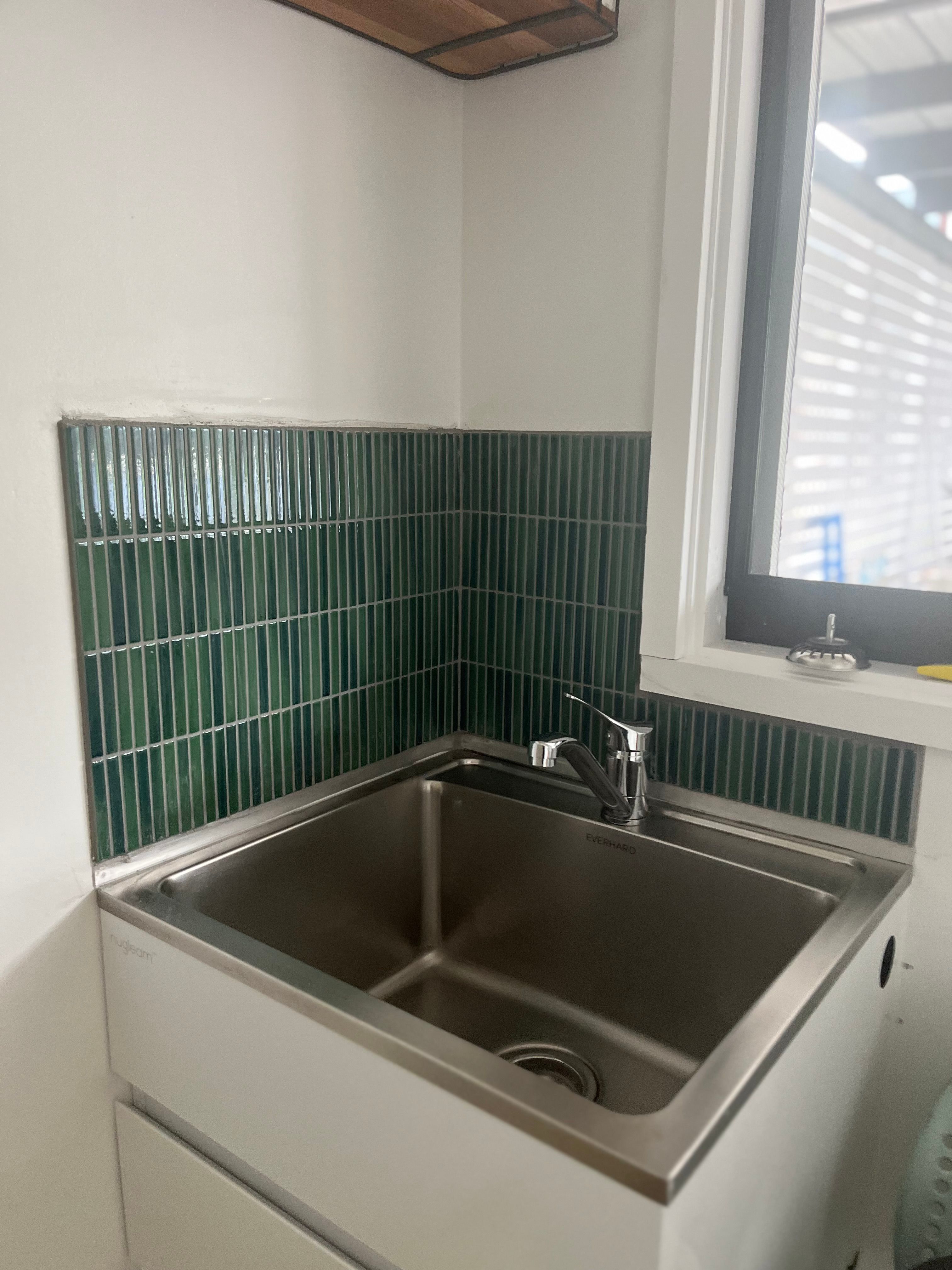 How to tile wall around a laundry trough... Bunnings community