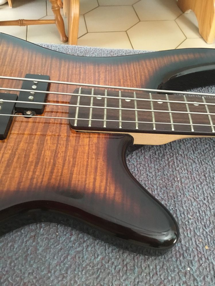 Close up of the guitar, not too easy to see the packing strips