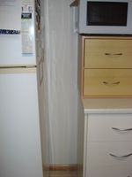 Id like to build a pull out pantry shelf between my fridge & kitchen cupboard. Its a 25cm gap from fridge to bench