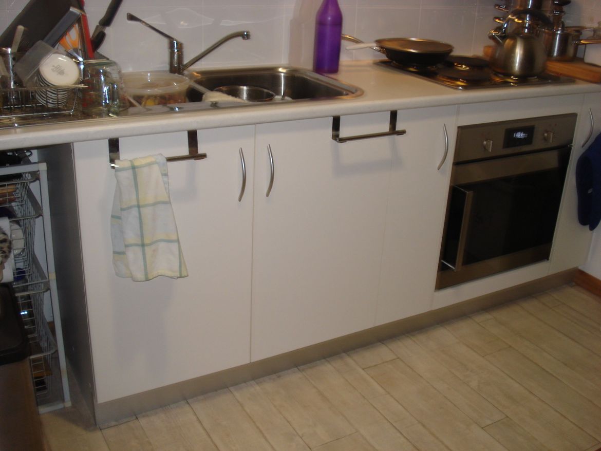 I have a double cupboard under the sink and the top shelf is all plumbing