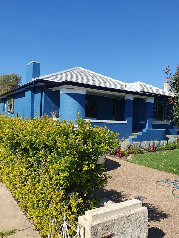 How to paint eaves and gutters of a red Bunnings community