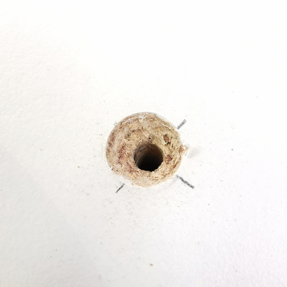 2.4 Hole ready for screw.png