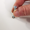 4.1 Placing screw in hole.png